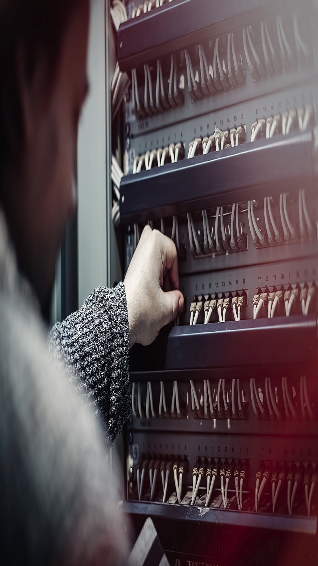 man tending to database